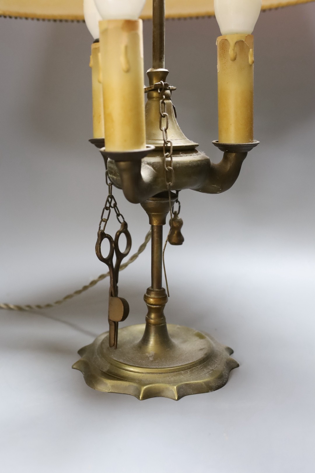 An Eastern brass converted lamp with attached snuffer